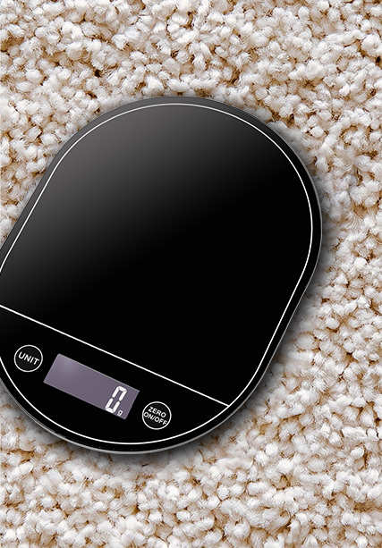 How does an Electronic Kitchen Scale measure weight and provide readings?